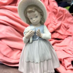 Lladro Pink and White Porcelain Figurine